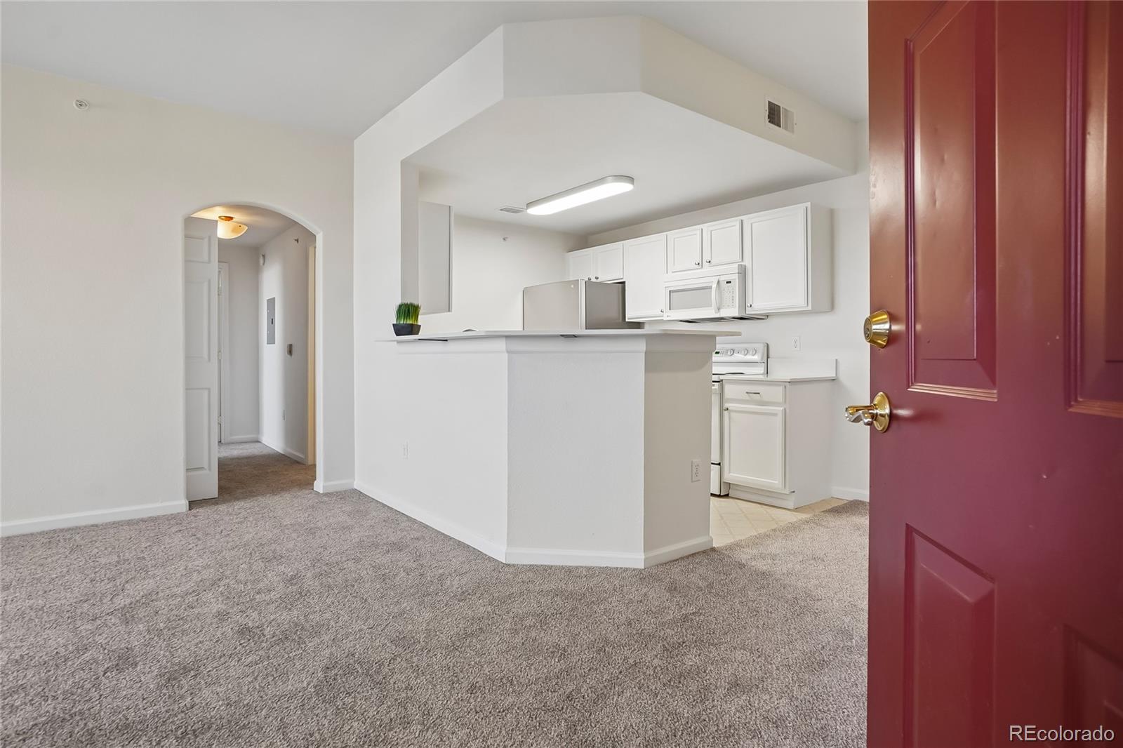 7440 S Blackhawk Street Unit: 11-203