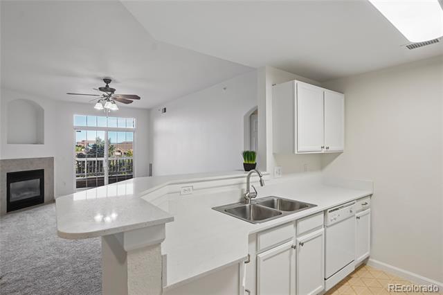 7440 S Blackhawk Street Unit: 11-203