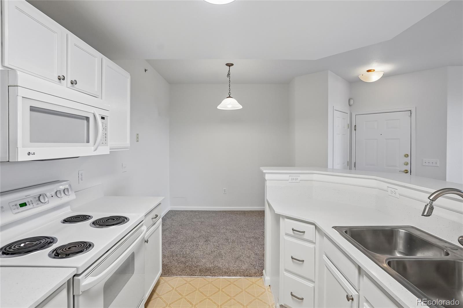 7440 S Blackhawk Street Unit: 11-203