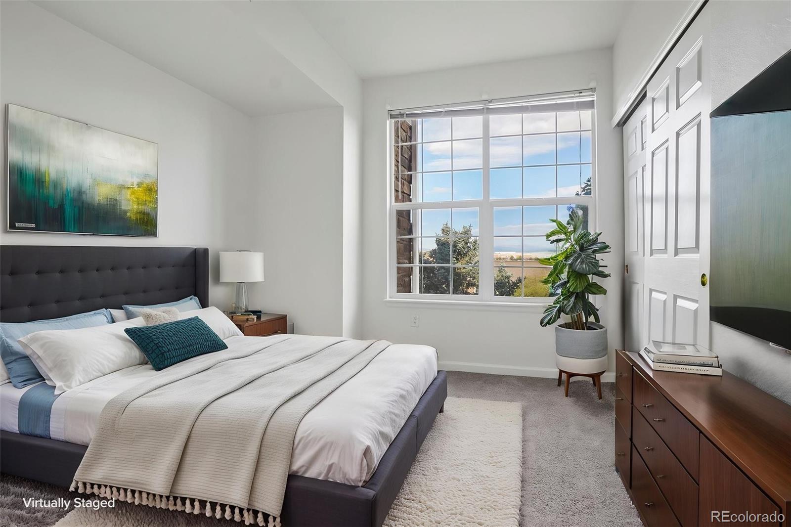 7440 S Blackhawk Street Unit: 11-203