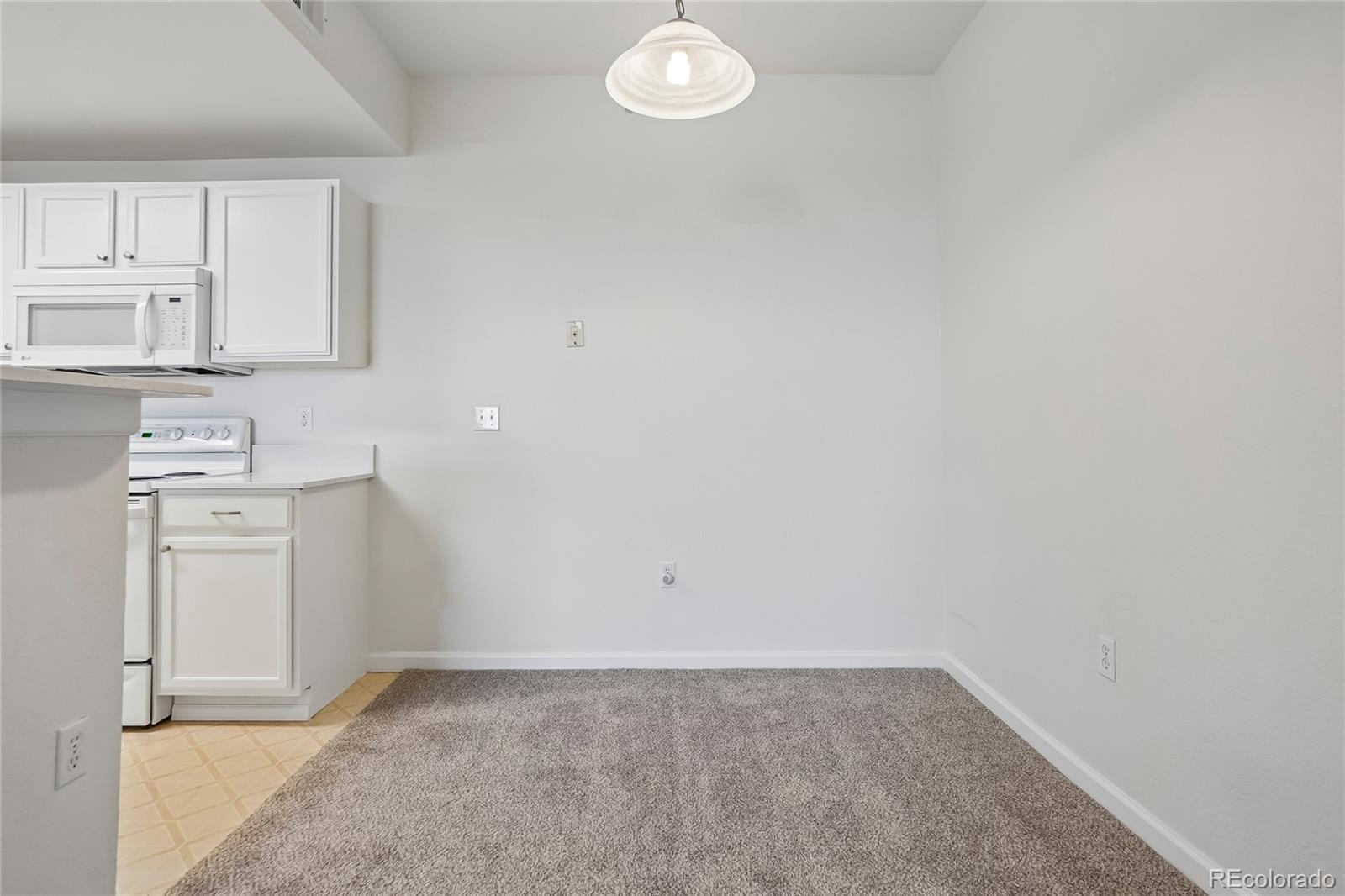 7440 S Blackhawk Street Unit: 11-203
