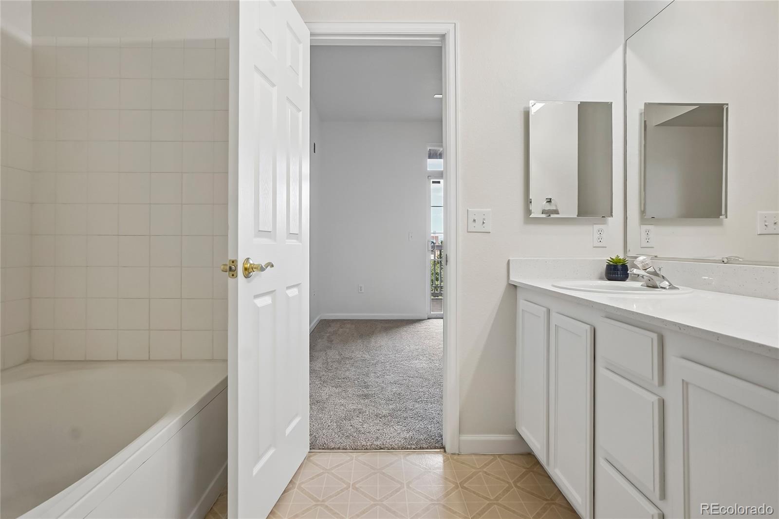 7440 S Blackhawk Street Unit: 11-203