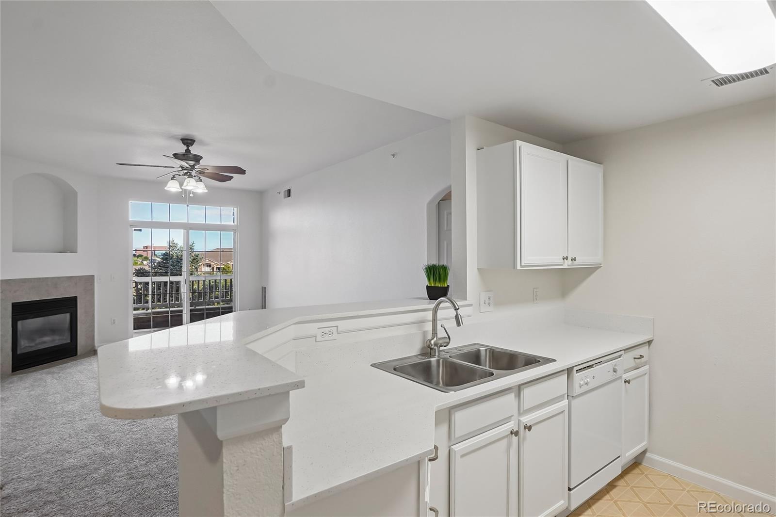 7440 S Blackhawk Street Unit: 11-203