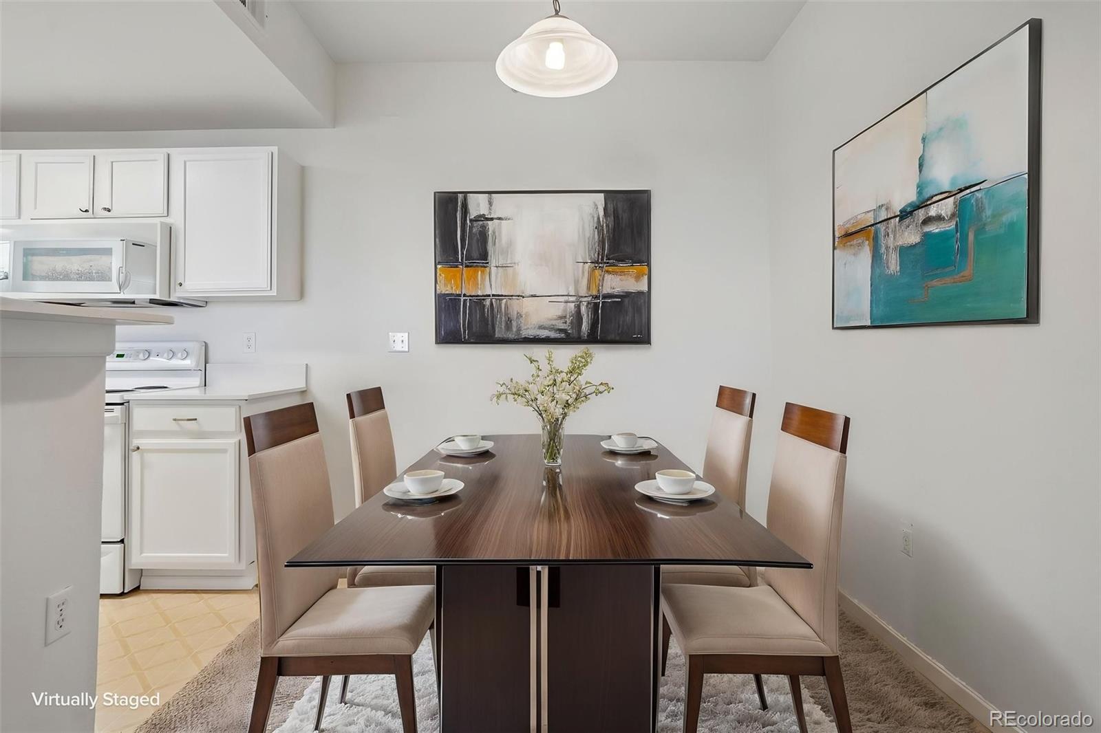 7440 S Blackhawk Street Unit: 11-203