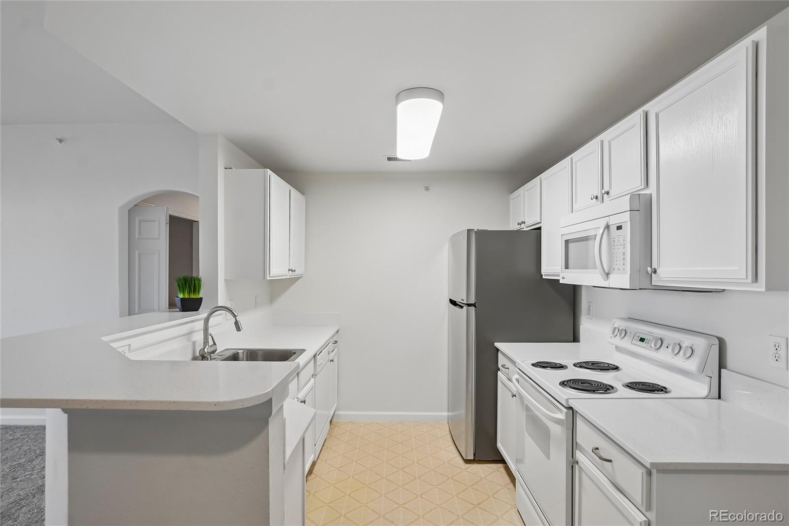 7440 S Blackhawk Street Unit: 11-203
