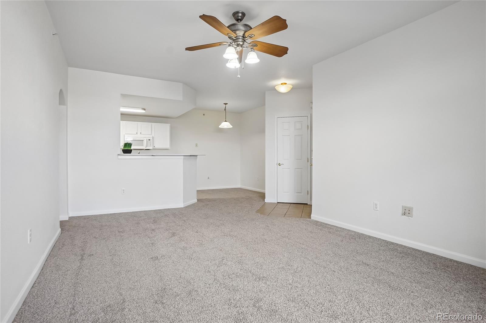 7440 S Blackhawk Street Unit: 11-203