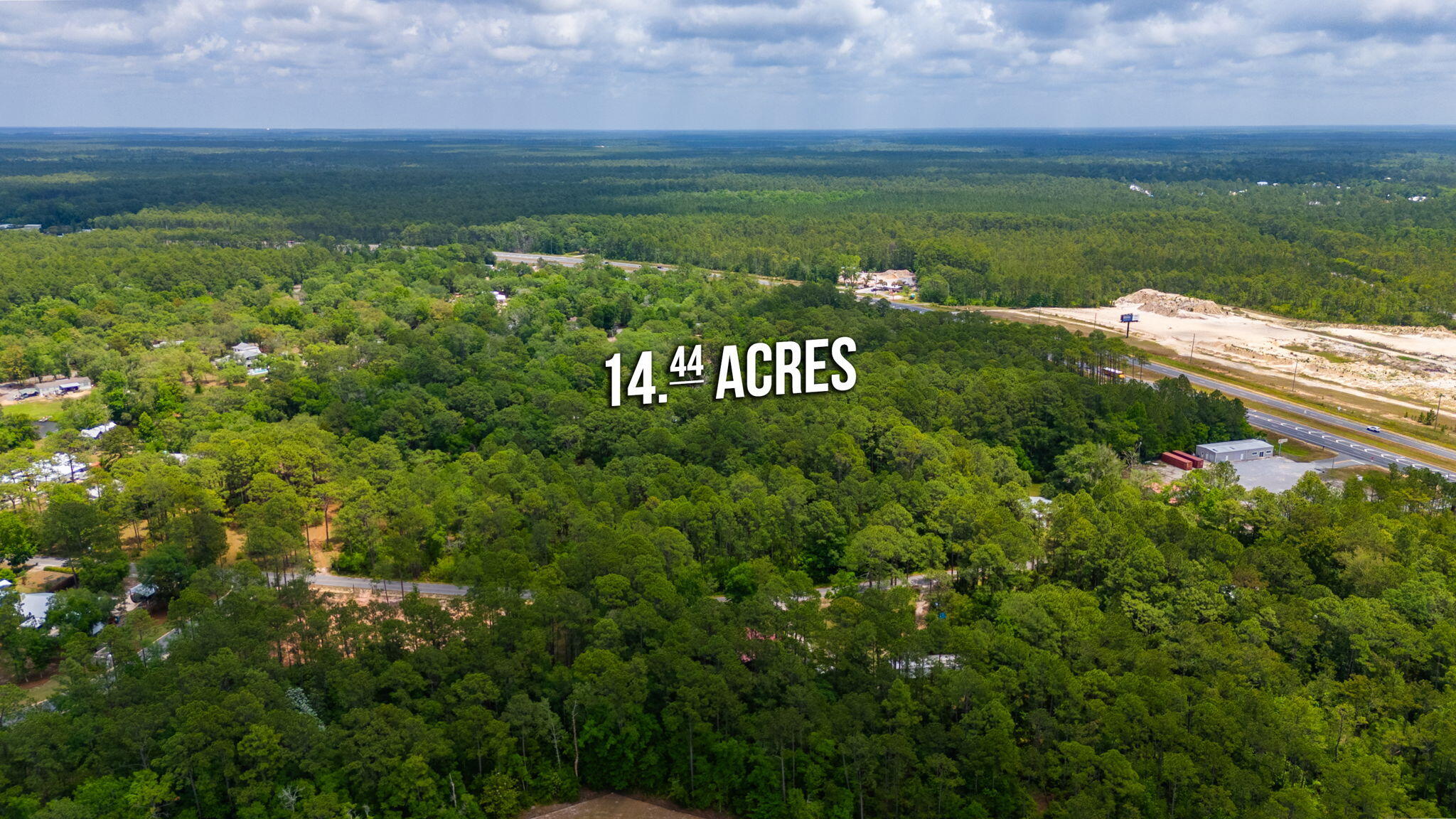 Aerial view of 14.44 wooded acres beside US Highway 331.