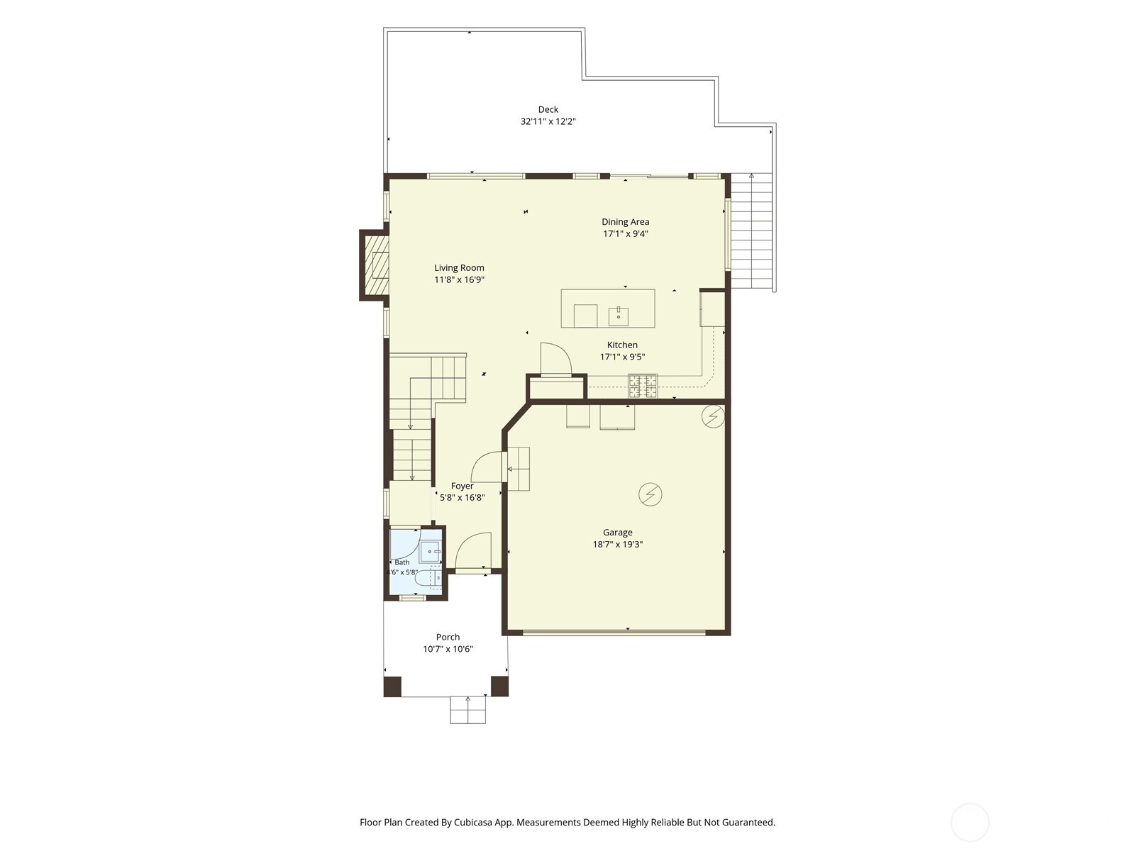 Floor plan showing the living and dining areas, kitchen, garage, porch, and rear deck.
