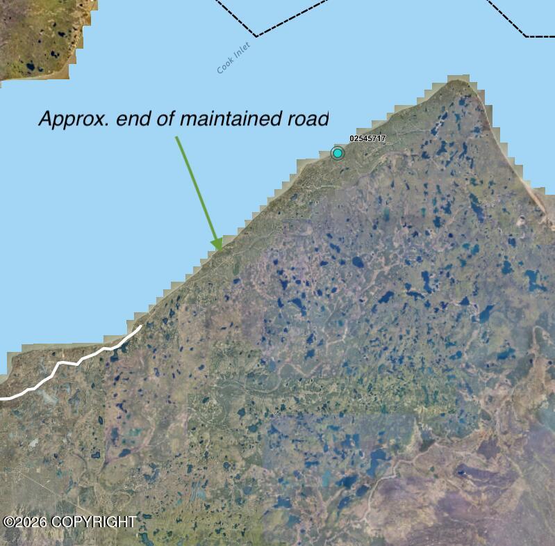 Satellite map marking property 02545717 near Cook Inlet and the approximate end of the maintained road.