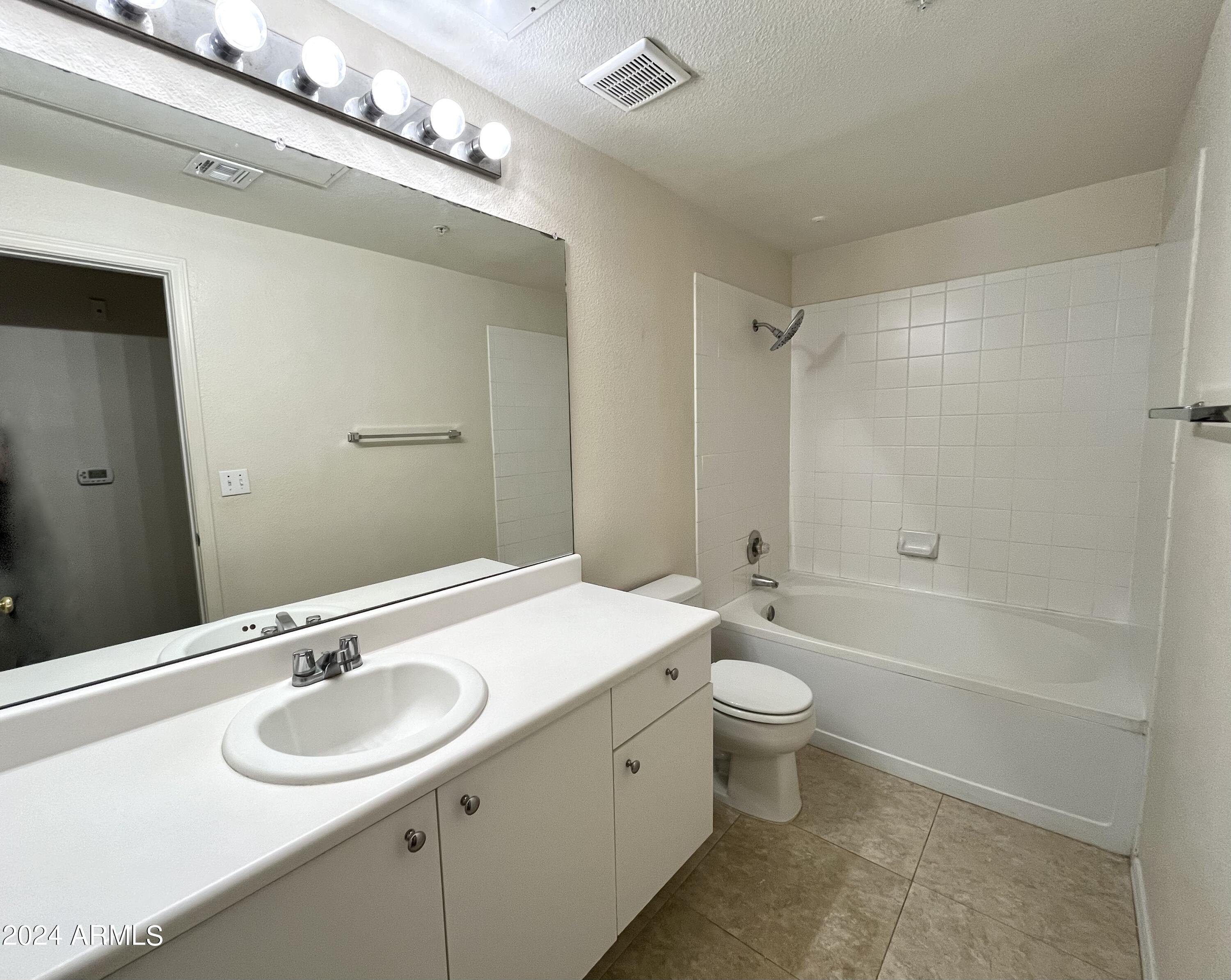 5345 E Van Buren Street, 210