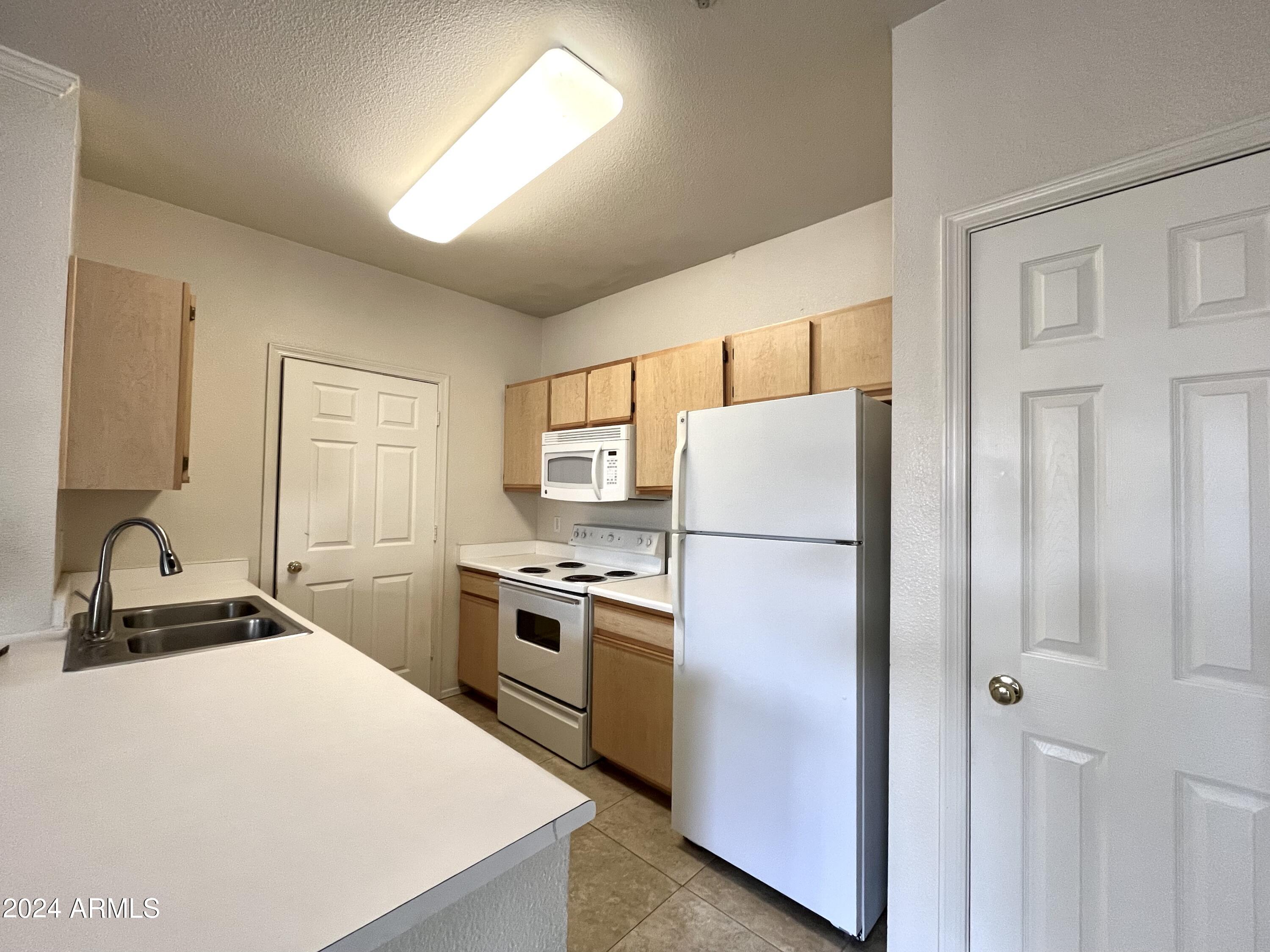 5345 E Van Buren Street, 210