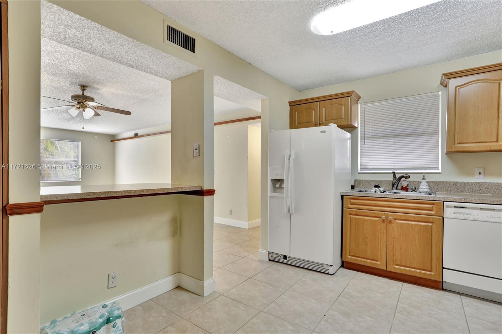 12001 Royal Palm Blvd # 1M