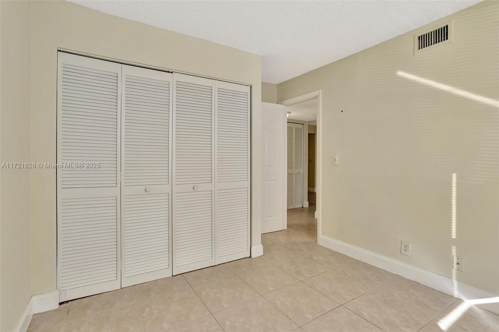 12001 Royal Palm Blvd # 1M
