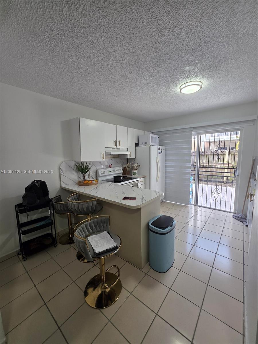 7673 W 29th Ln # 47 Unit: 102-47