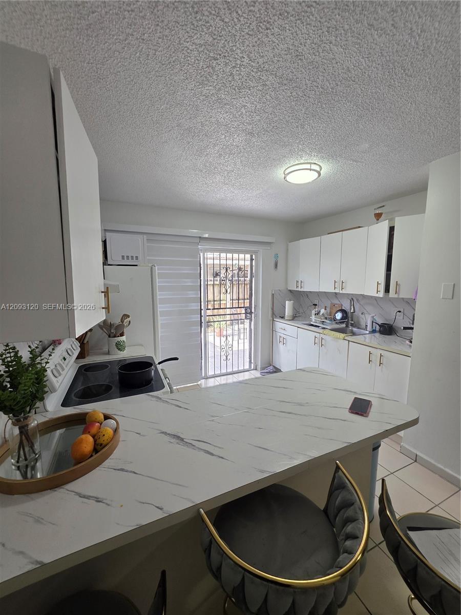 7673 W 29th Ln # 47 Unit: 102-47