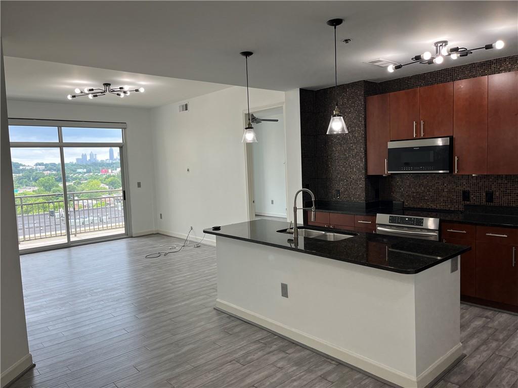 711 COSMOPOLITAN Drive NE Unit 716