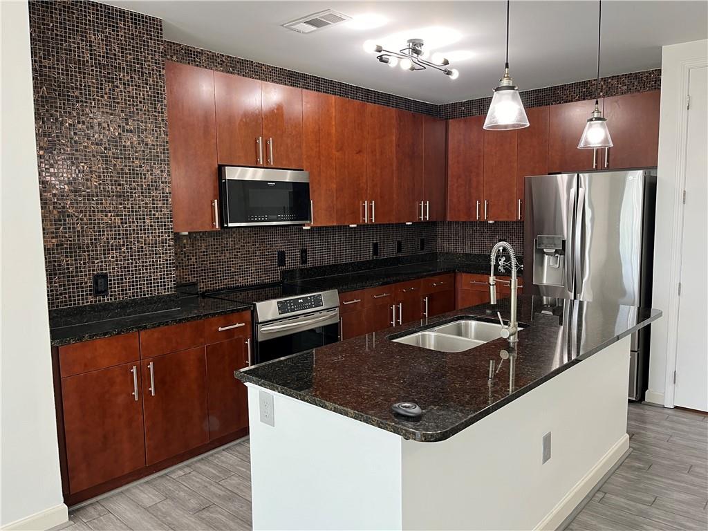 711 COSMOPOLITAN Drive NE Unit 716