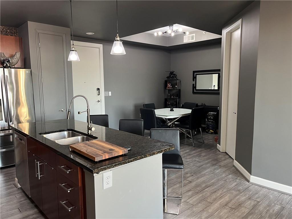711 COSMOPOLITAN Drive NE Unit 716