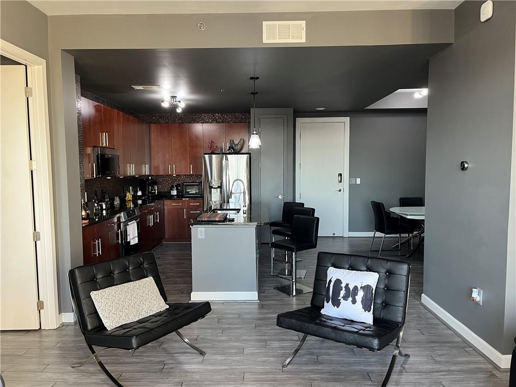 711 COSMOPOLITAN Drive NE Unit 716