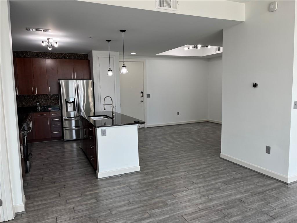 711 COSMOPOLITAN Drive NE Unit 716