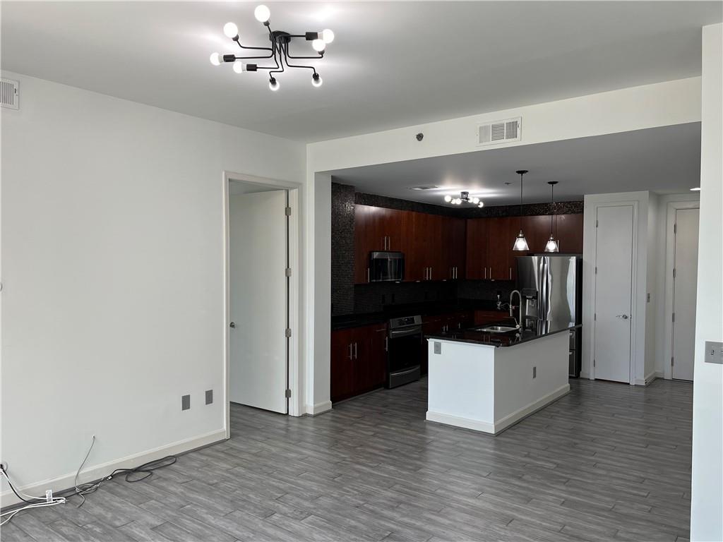 711 COSMOPOLITAN Drive NE Unit 716