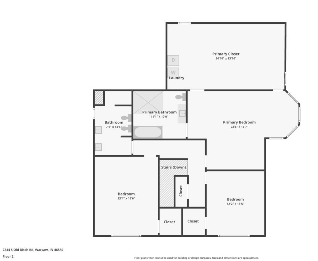 Second-floor plan with a primary suite, two bedrooms, two bathrooms, laundry, and closets.