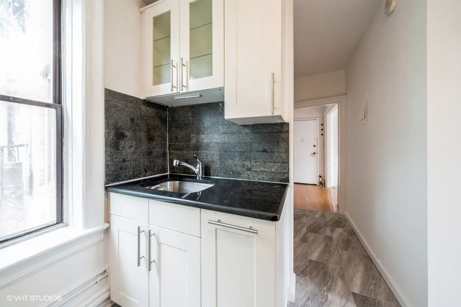 145 HARRISON AVE Unit: 104