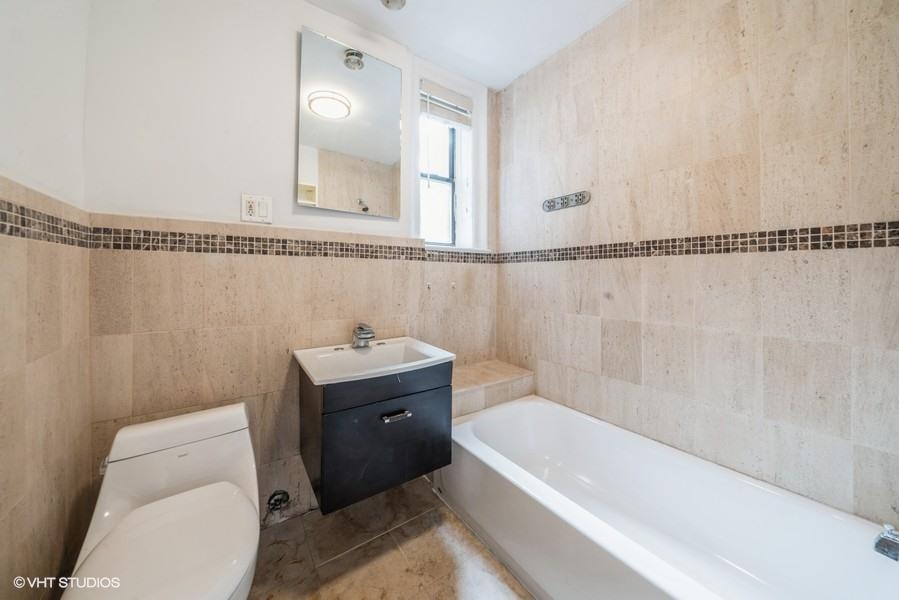 145 HARRISON AVE Unit: 104