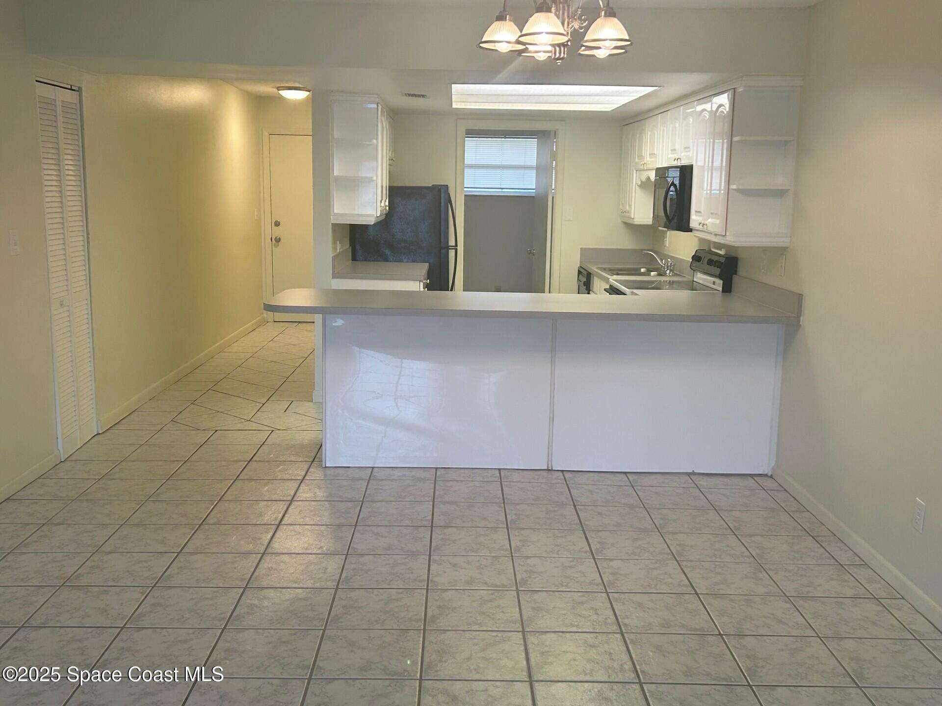 2135 N Courtenay Parkway, 142