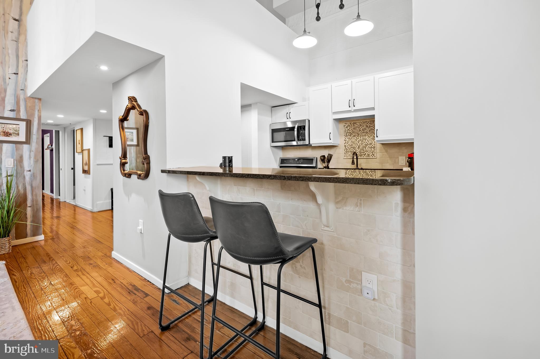 112 E West St #201