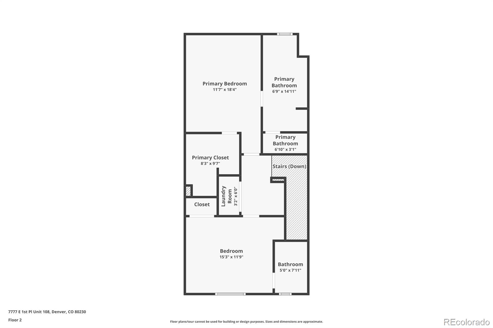 Second-floor plan showing two bedrooms, three bathrooms, closets, laundry room, and stairs.