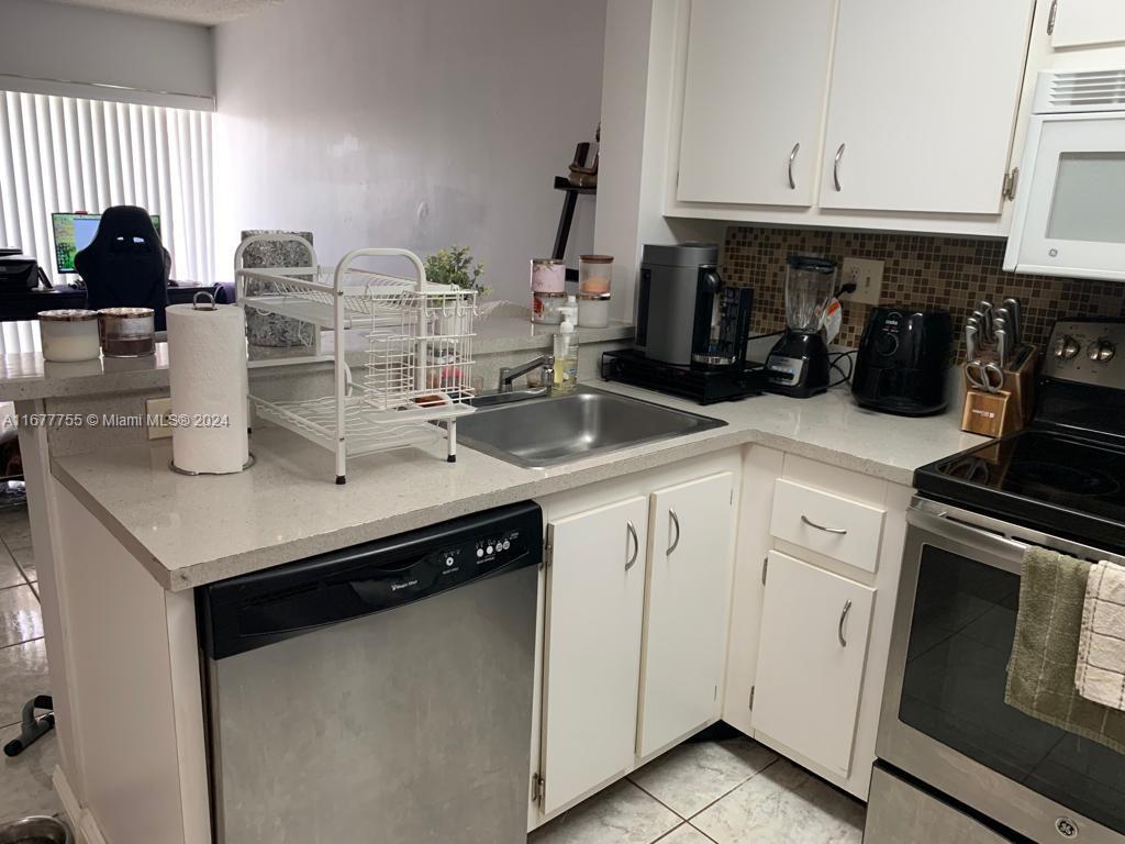 8660 NW 6th Ln # 203 Unit: 5-203