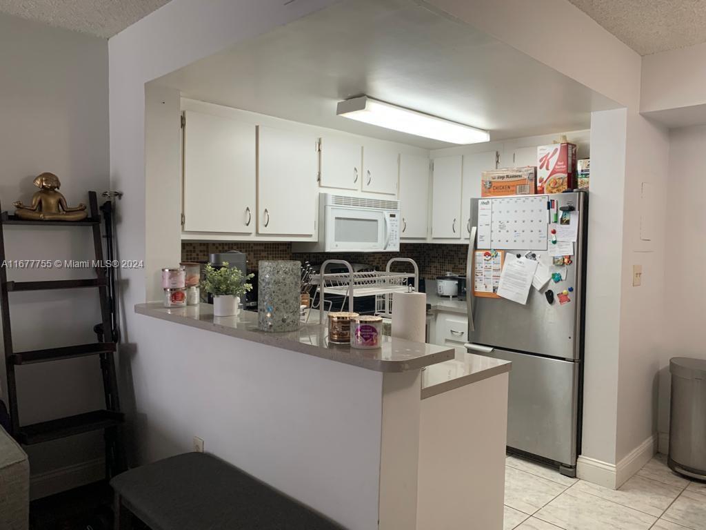 8660 NW 6th Ln # 203 Unit: 5-203