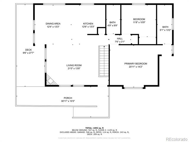 Floor plan showing a living room, kitchen, dining area, two bedrooms, deck, and porch.
