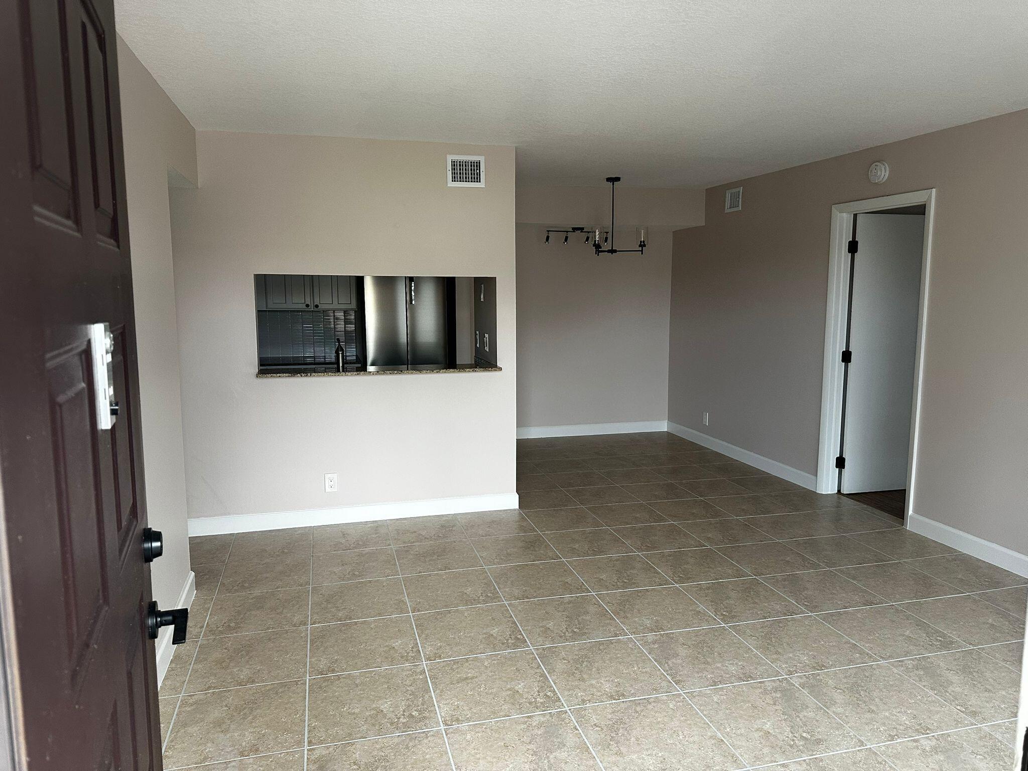 7221 Golf Colony Court 203