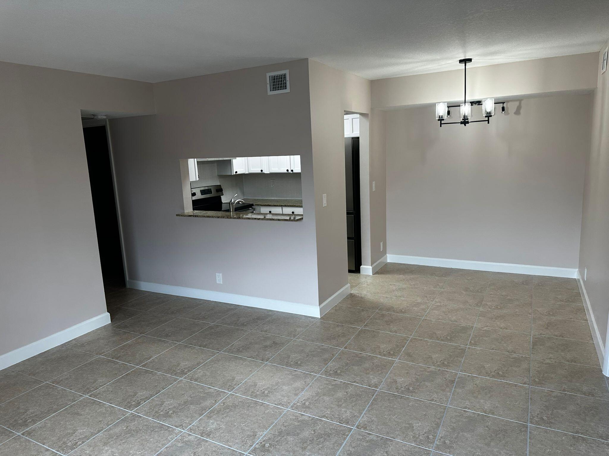 7221 Golf Colony Court 203