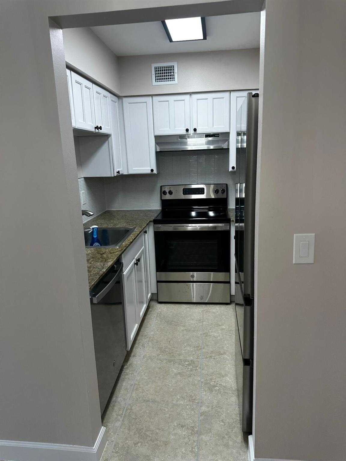 7221 Golf Colony Court 203