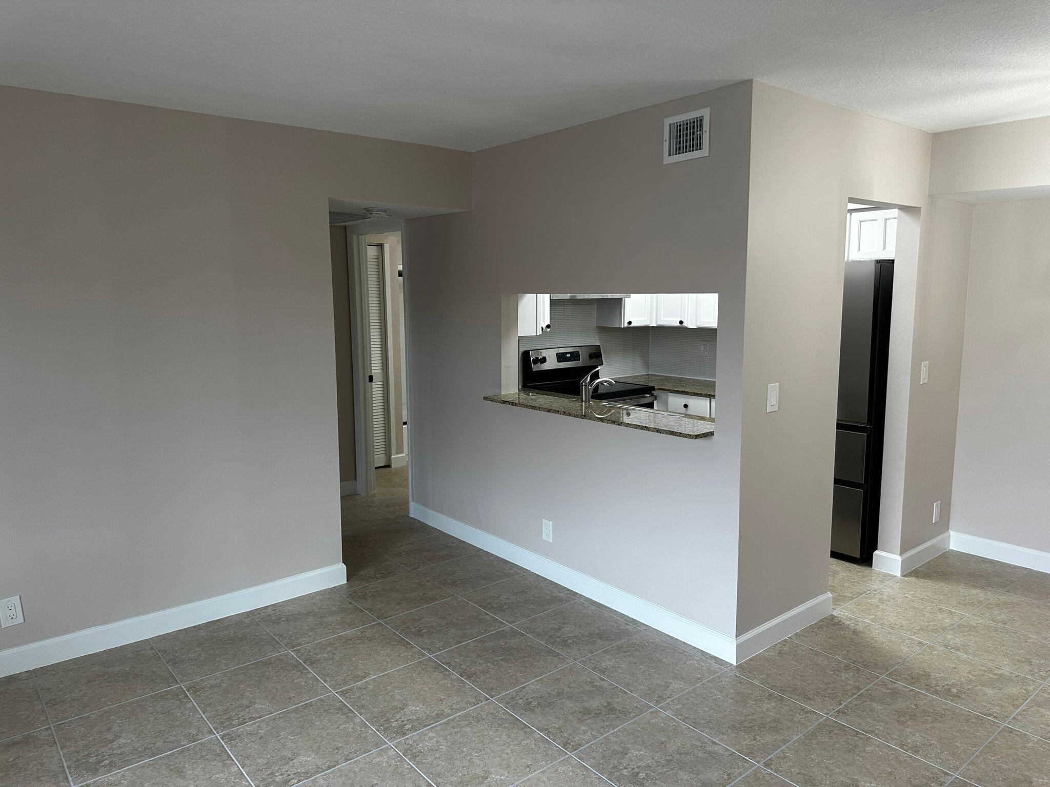 7221 Golf Colony Court 203