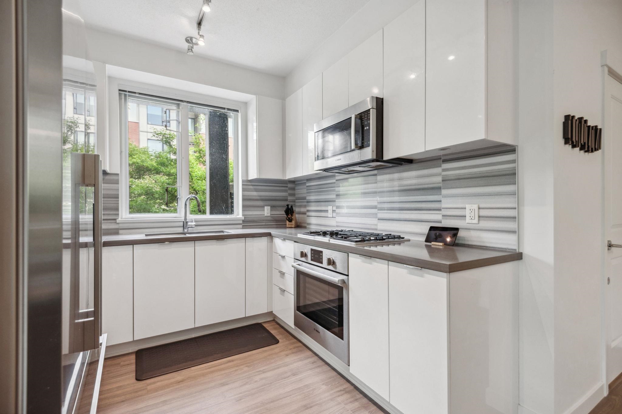 107 3138 RIVERWALK AVENUE Unit: 107