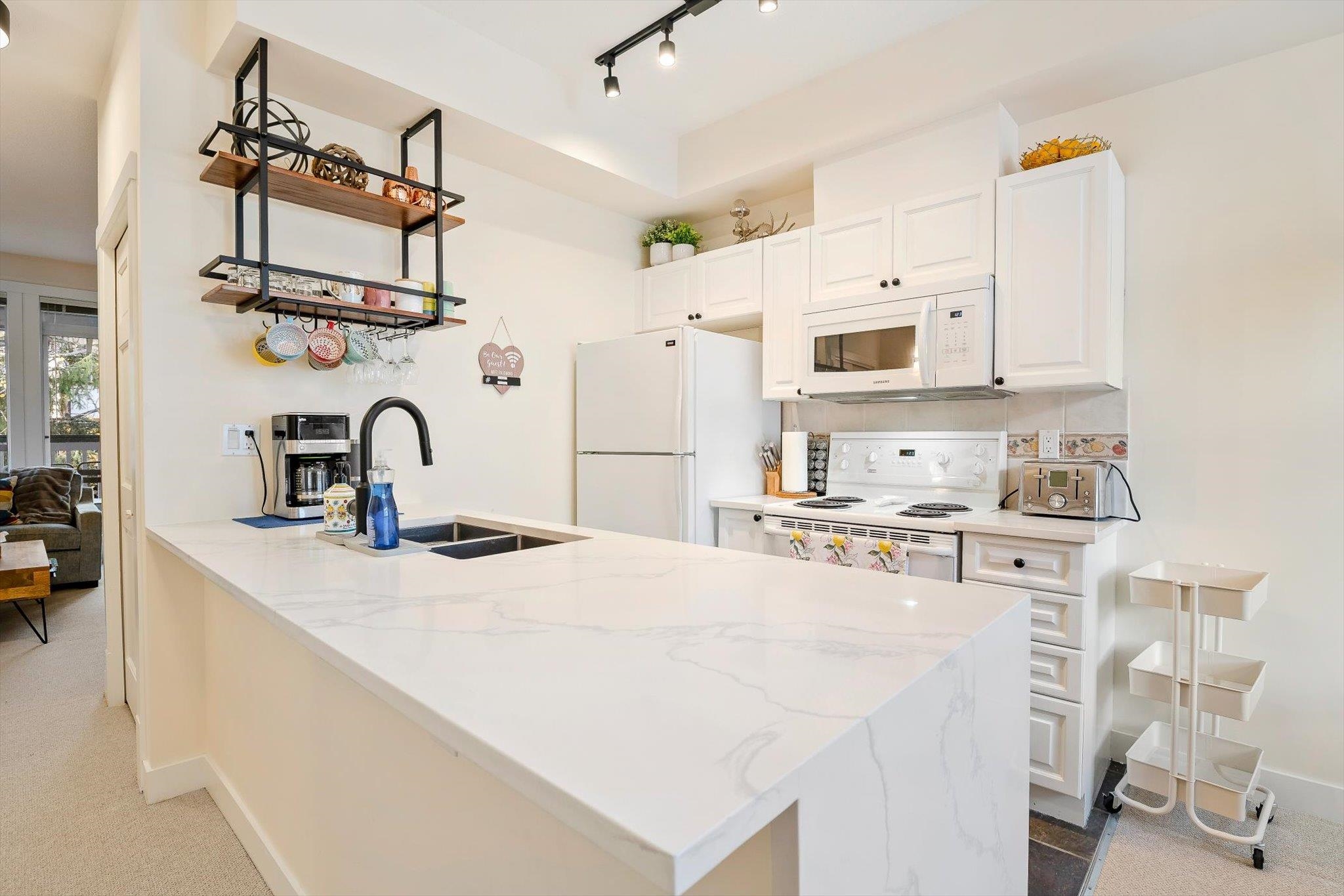203 4405 BLACKCOMB WAY Unit: 203