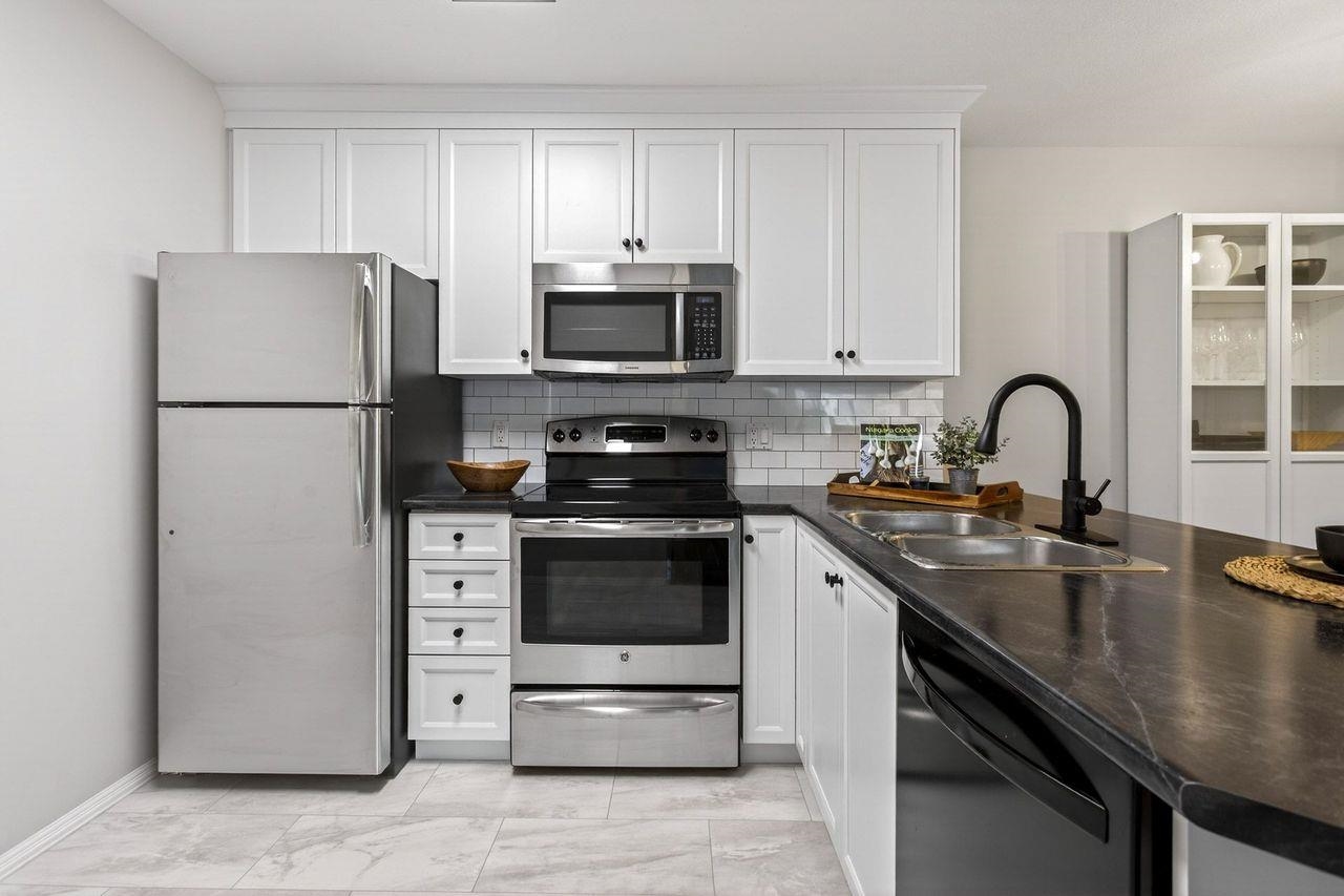 104 11960 HARRIS ROAD Unit: 104