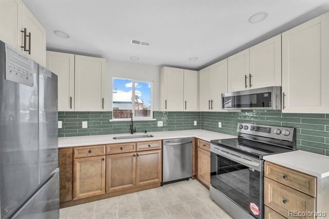 6631 E 77th Place