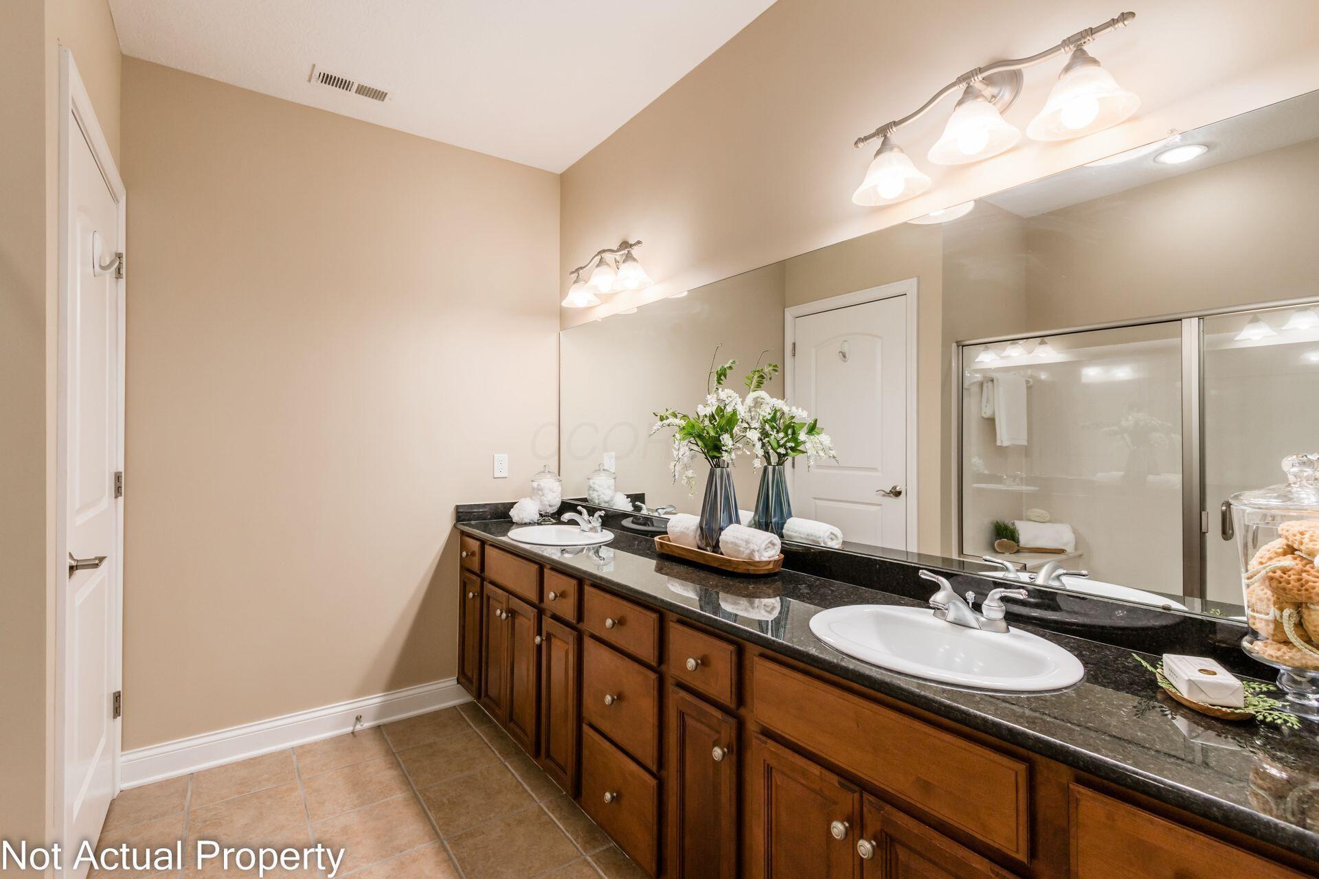 705 N State Street, 211