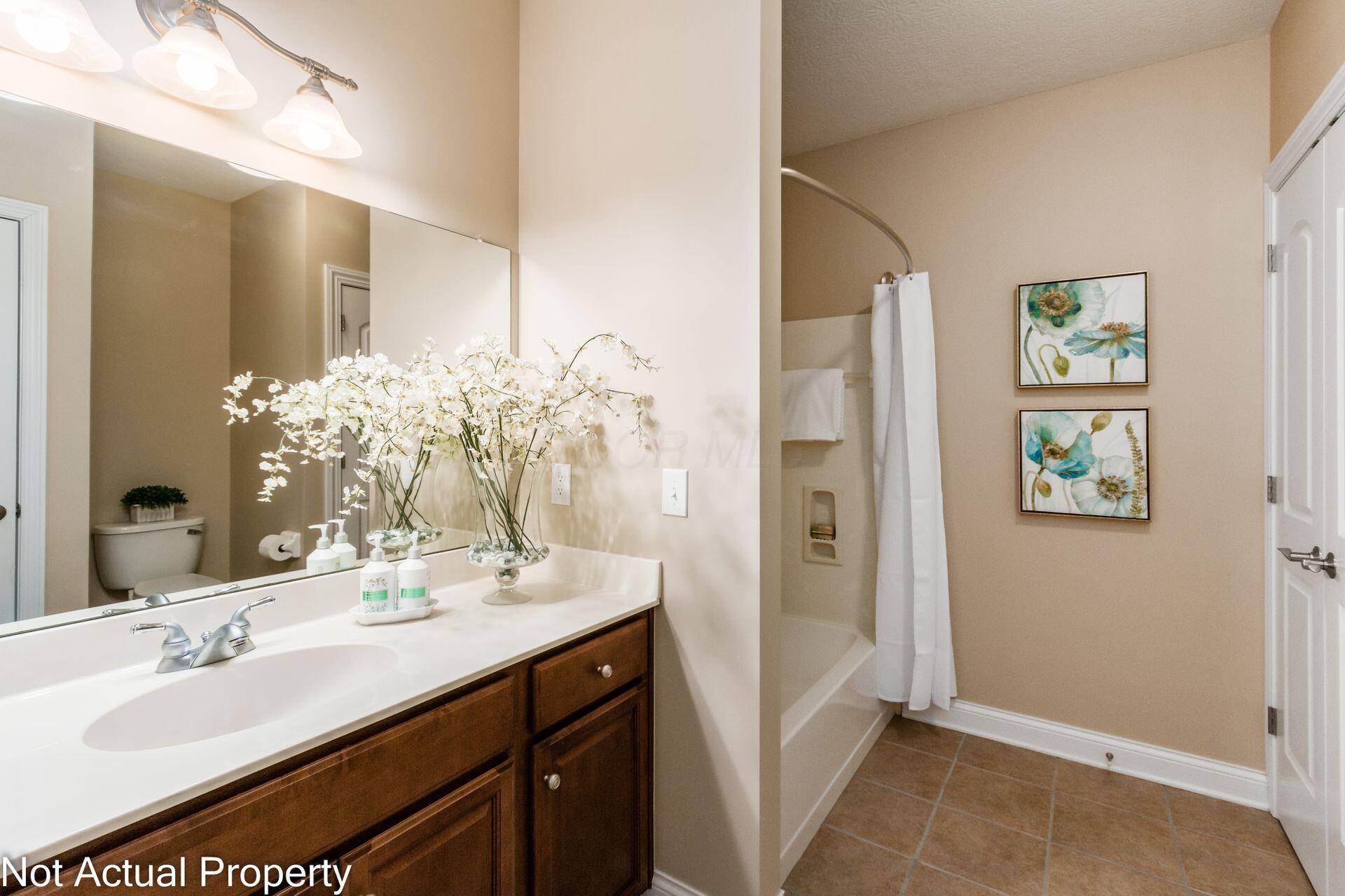 705 N State Street, 211