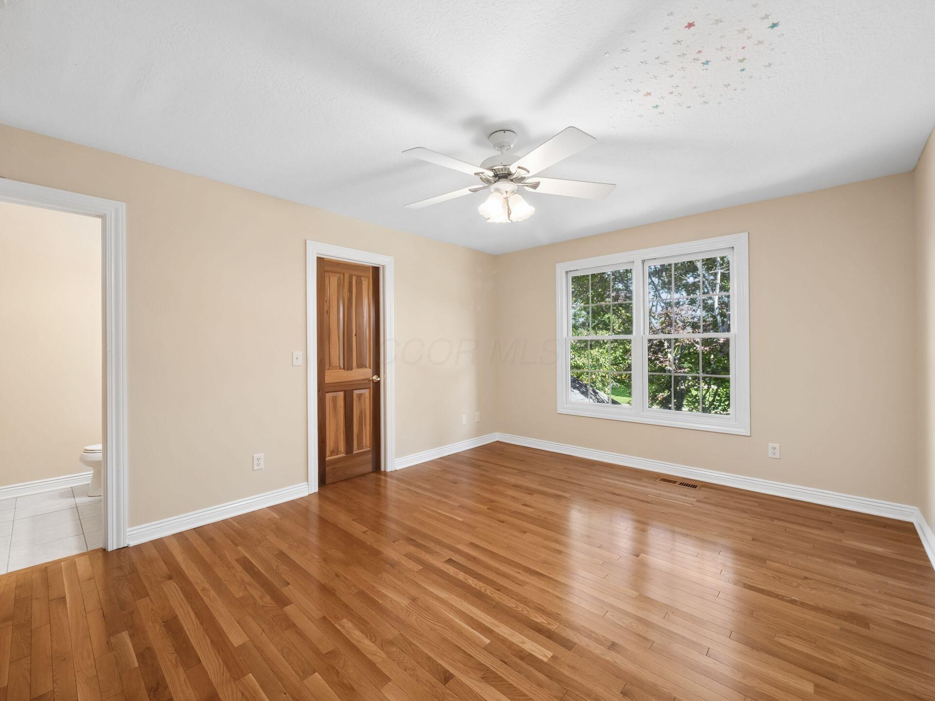 8242 Harvest Wind Drive