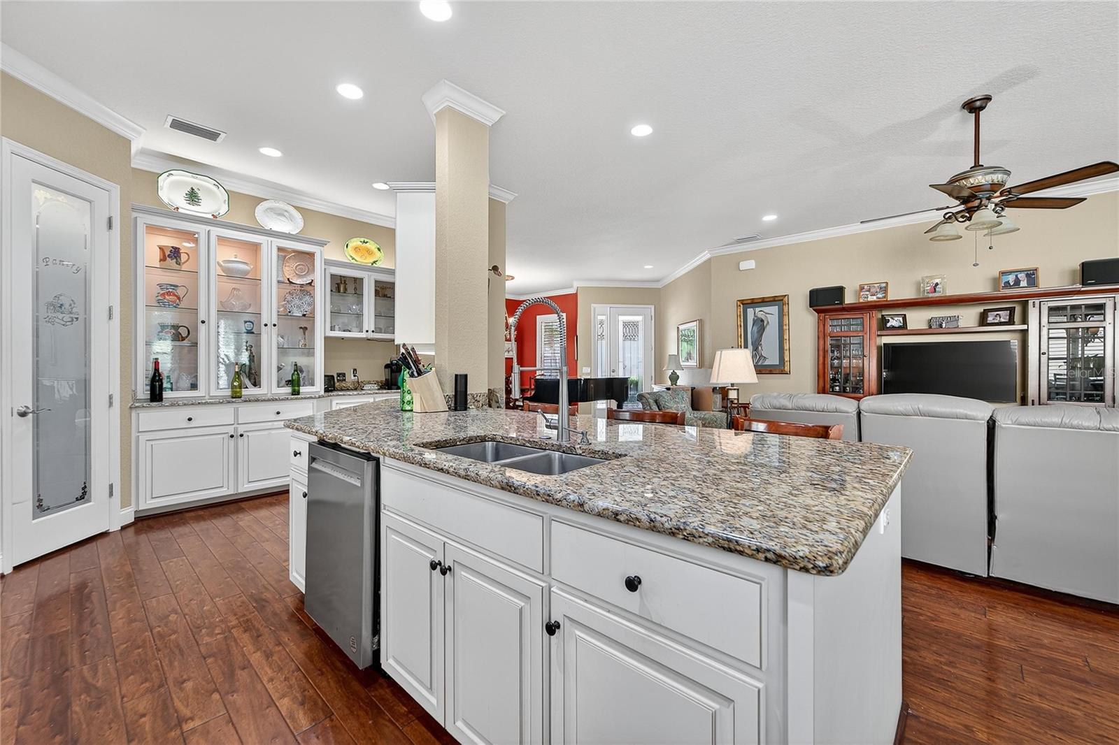 Kitchen and dinette area overlooking living space