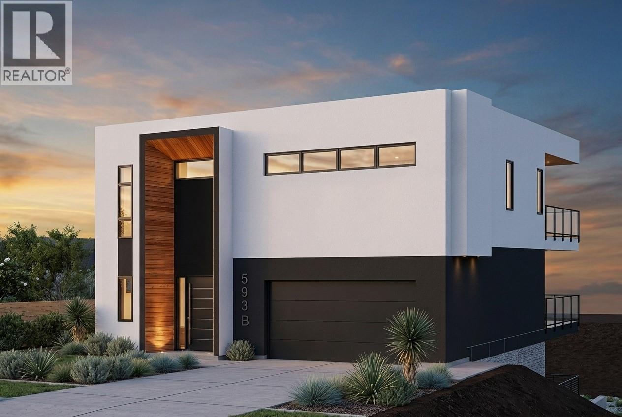 Modern two-story home with a wood-lined entry, charcoal garage, and landscaped driveway at sunset.