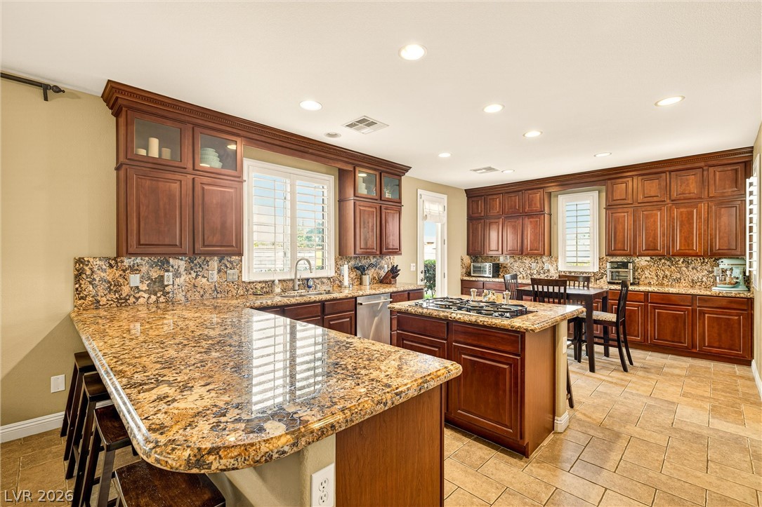 12240 Montura Rosa Place