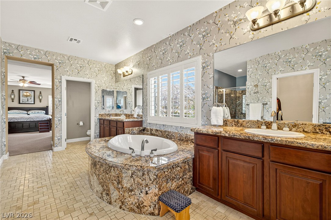 12240 Montura Rosa Place