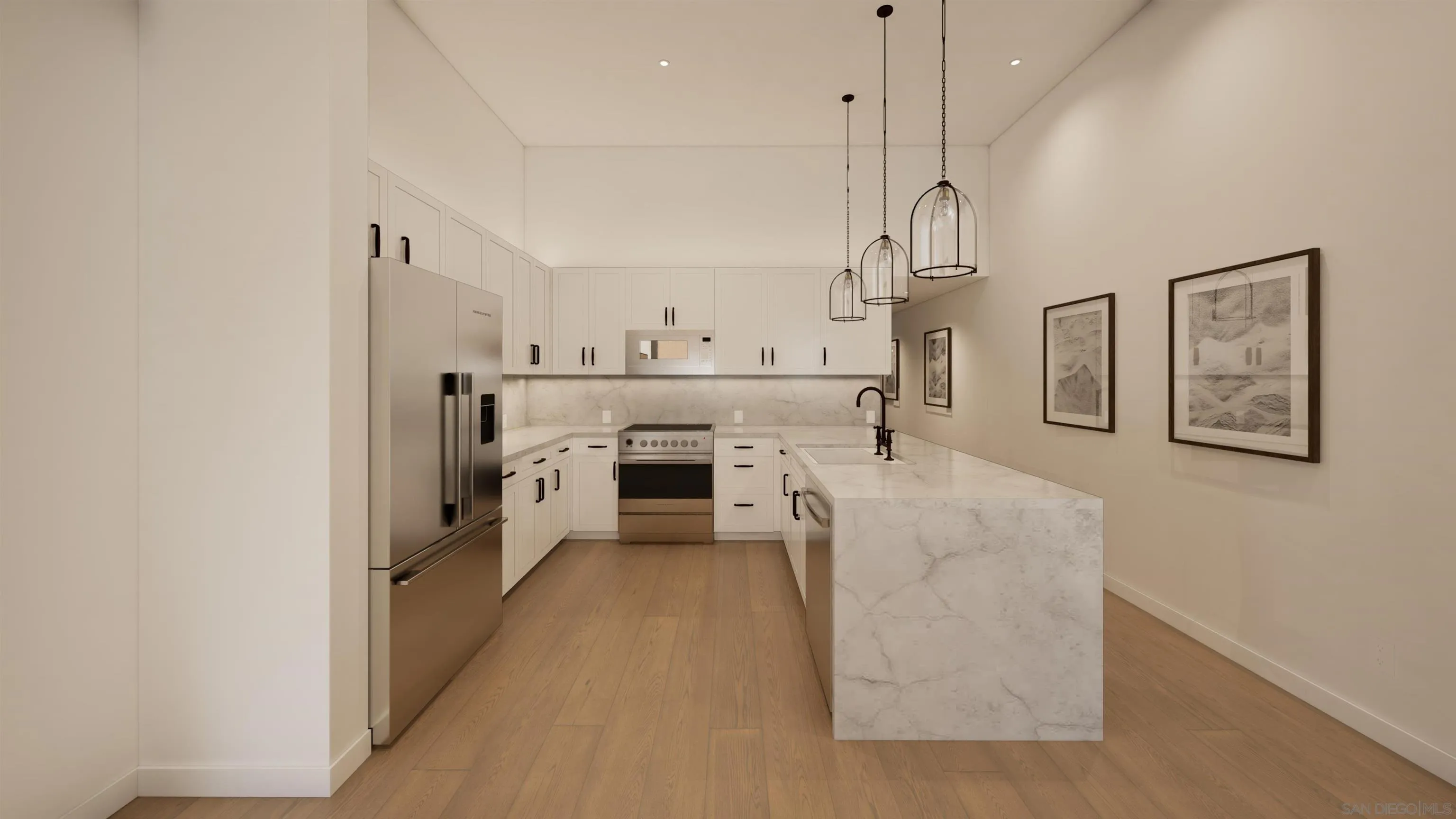 Modern kitchen with white cabinetry, stainless steel appliances, and a large marble island.